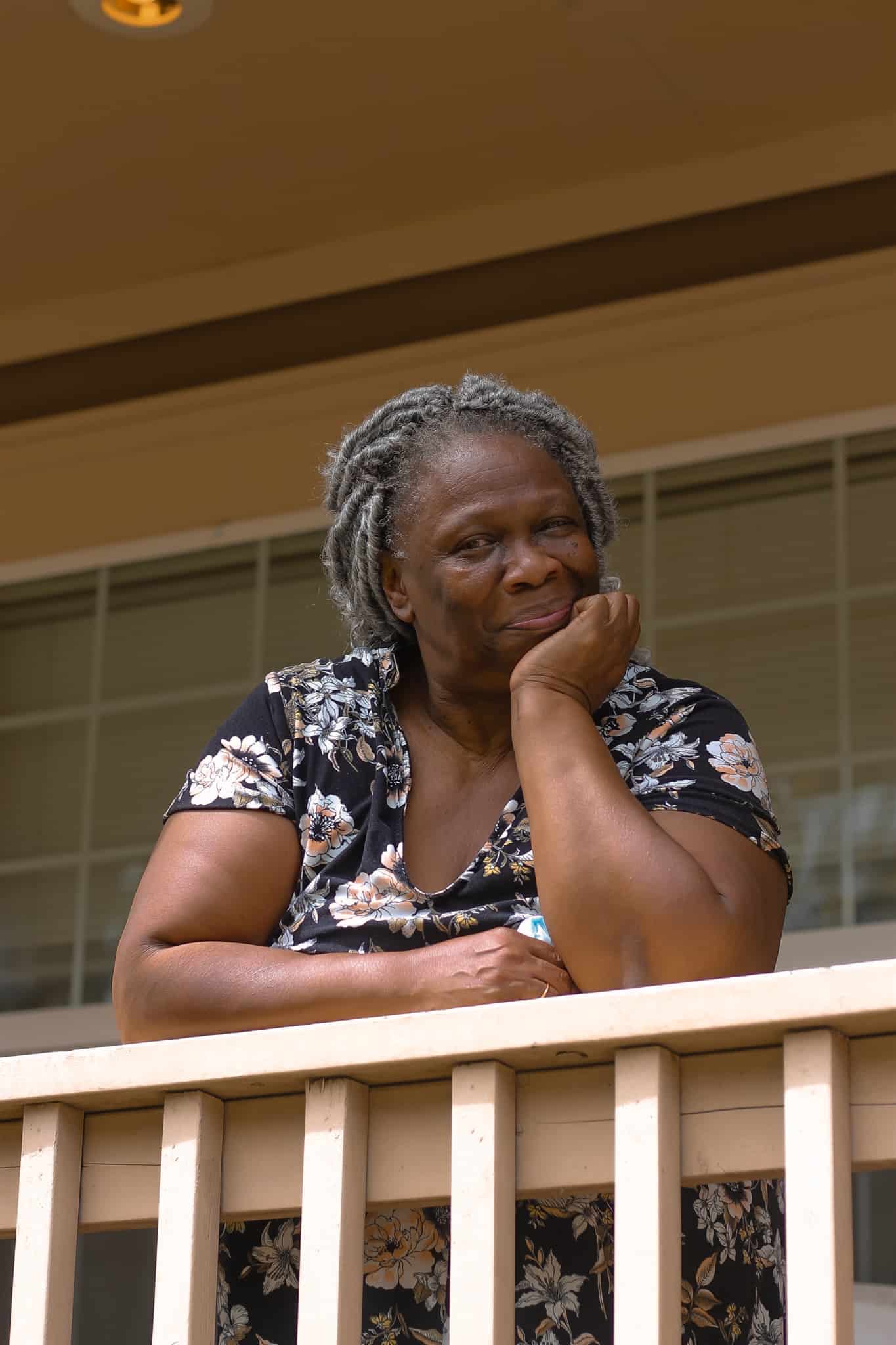 Woman on her front porch